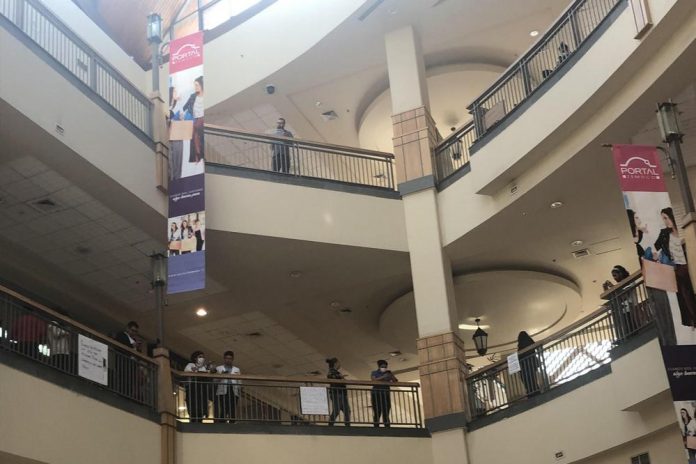 trabajadores shopping