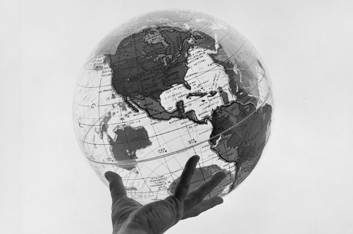 Hand Holding Globe